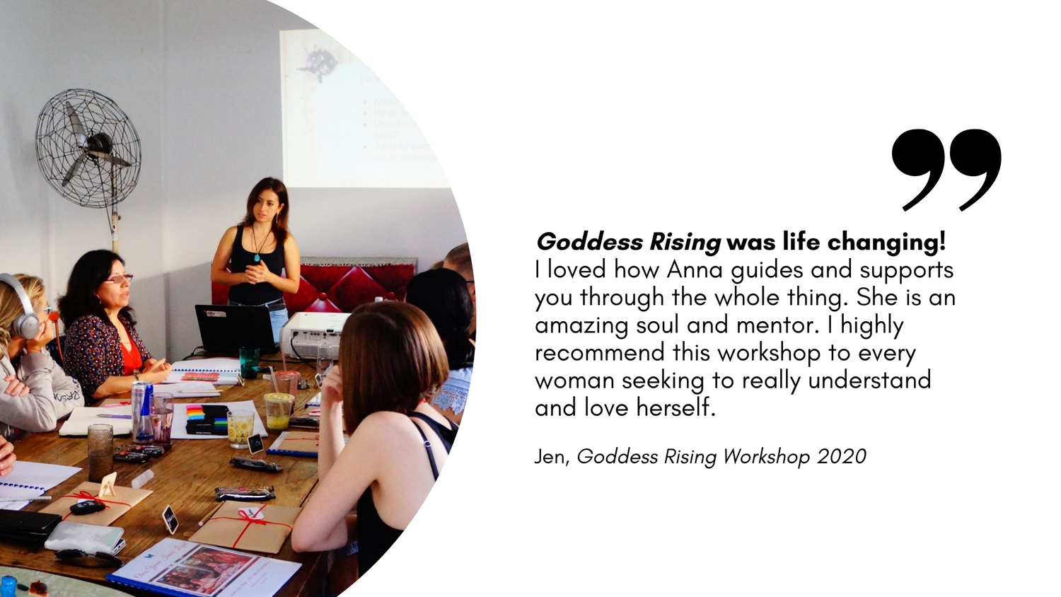 Jen's review about Anna Krjatian's Goddess Rising Workshop with an image of Anna standing at the head of the table where a group of people sit and listen as one person speaks.