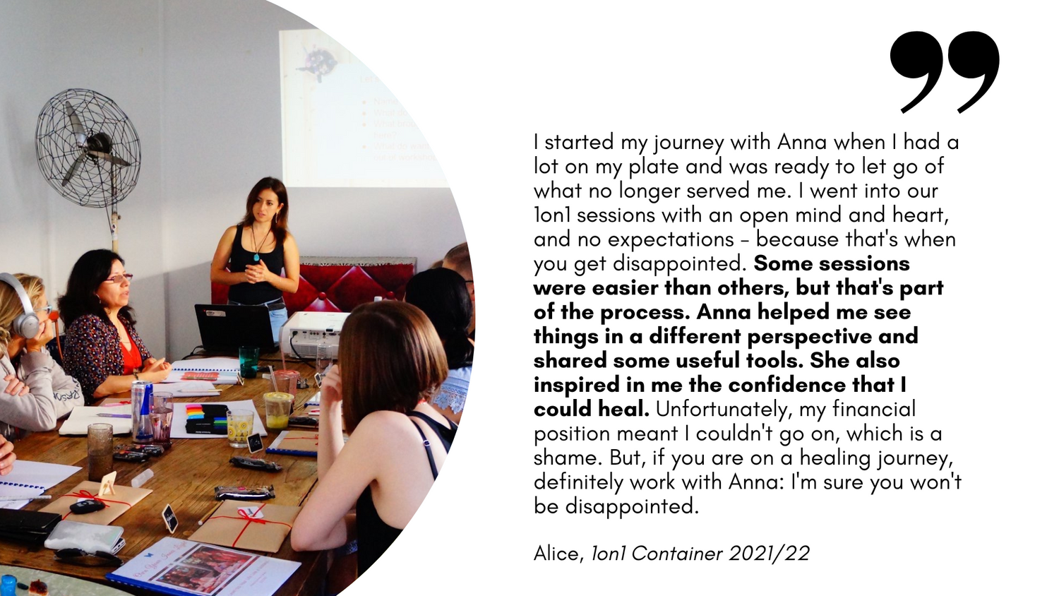 Alice's review on working with Anna Krjatian's in her 1on1 coaching container with an image of Anna standing at the head of the table where a group of people sit and listen as one person speaks.